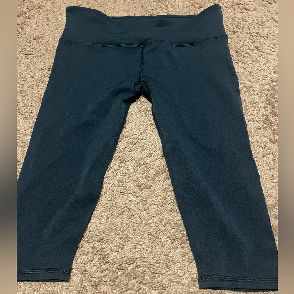 Lululemon Athletica True Navy Leggings with Breeze Holes (size 12)